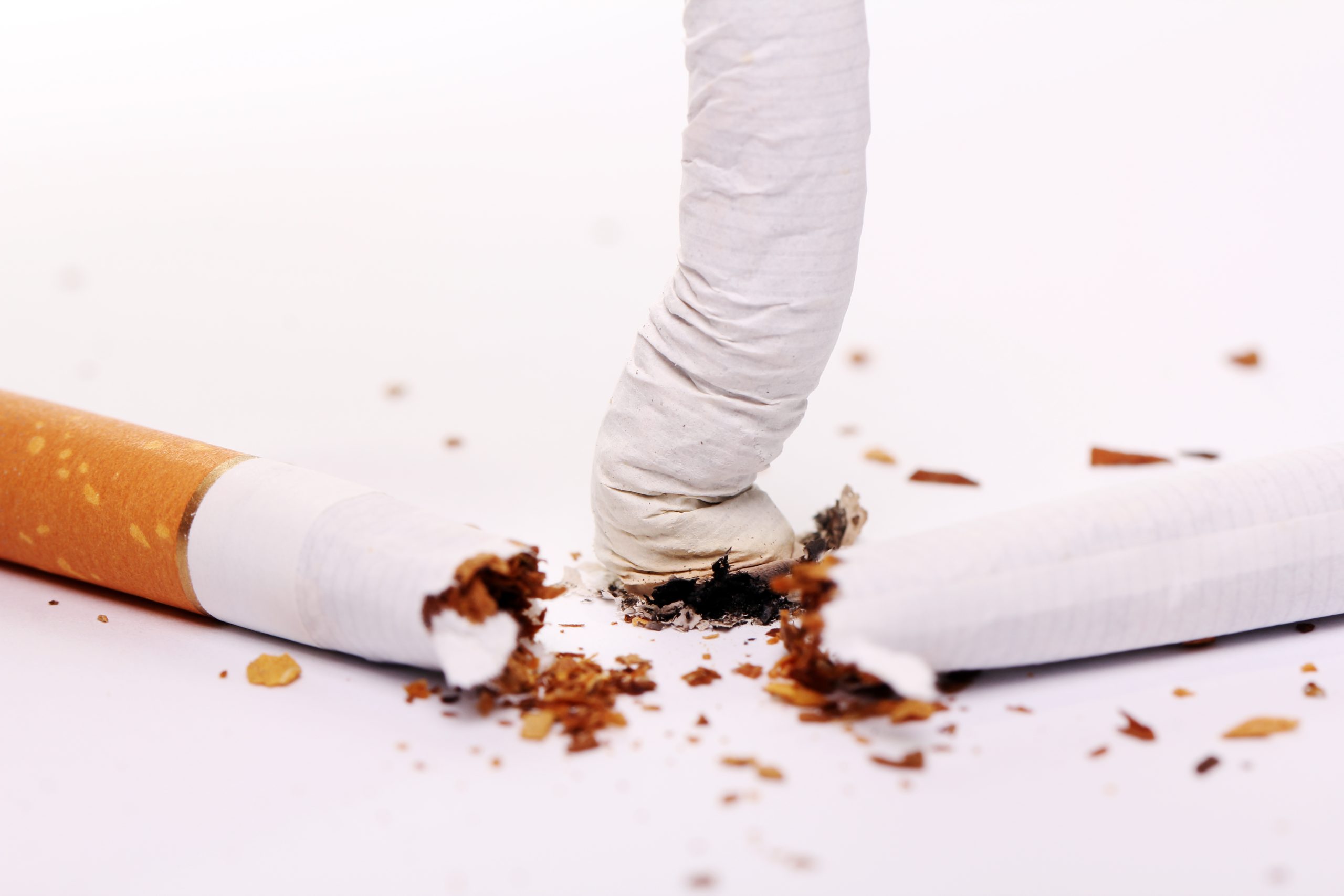 Close up of cigarette over white background